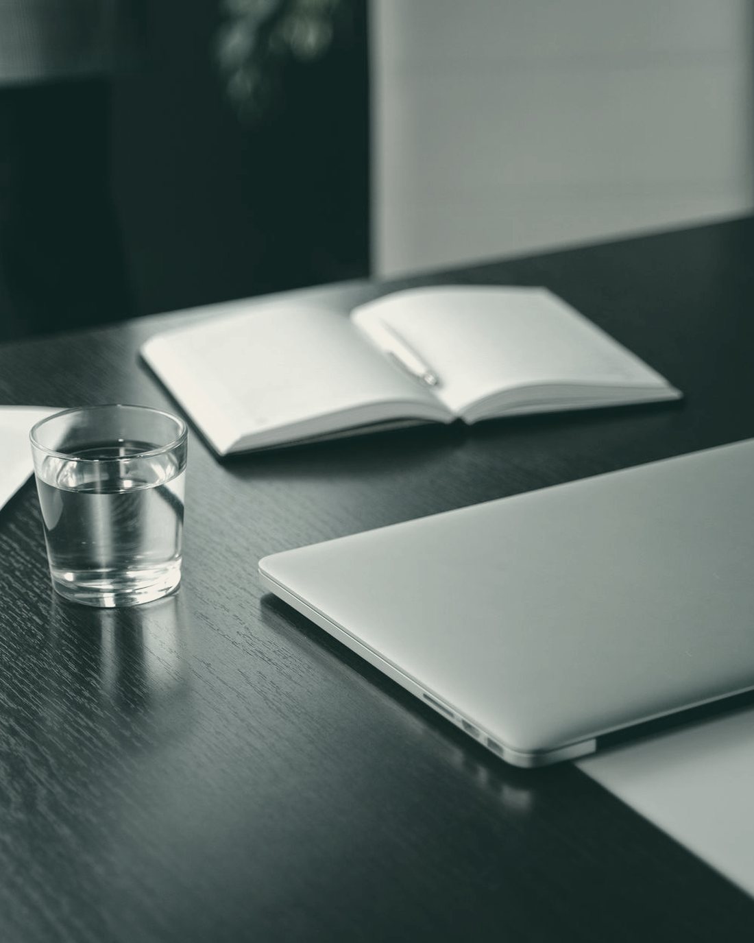 A studio desk with an open planner — the day-to-day of running an online operation.